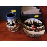 A Moorcroft Pottery vase, 'Christmas in the Pots', 10 cm high, and a matching dish, 12 cm