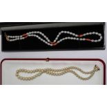 A single strand pearl and coral necklace with 9 carat gold clasp and another single strand pearl