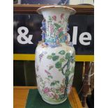 A Chinese famille rose vase, with applied dragons and decorated with exotic birds, dragonflies and