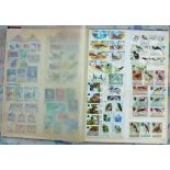 Postage Stamps: Two stock books of bird themed stamps