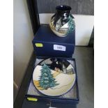 A Moorcroft Pottery Snow Village design vase, 2005, 8 cm high, and a matching dish 12 cm diameter,