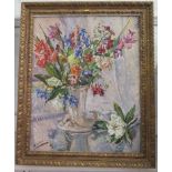 La Primaudaye A Still Life of flowers in a horn shaped vase oil on canvas signed 75 x 60 cm