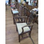 A harlequin set of eight George III style mahogany dining chairs, with interlaced splats, drop-in