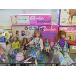 A collection of Sindy and Pippa's Pony dolls and accessories, including camping buggy with fold away