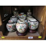 Nine crackle glazed style Chinese pottery vases