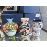 A Moorcroft Pottery Lapland design vase, signed on the base 2010, 8 cm high, and two other vases: