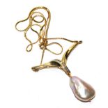 A pearl and diamond pendant, set in 18 carat gold