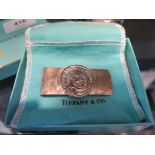 A Tiffany & Co silver money clip, engraved Exxon Chemicals 1988, boxed