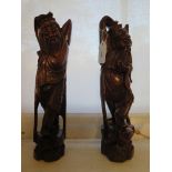 A pair of Japanese carved wood okimono figures, inset with wire decoration, depicting dancing