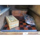 An African carved chess set and board, a straw-work box containing a mini chess set and a mahogany