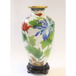 A Chinese Jingfa cloisonne vase with floral design, 26.5cm high, with carved wooden stand and