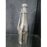 A silver plated novelty stirrup cup, in the form of a bottle of champagne, by Parks London