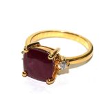 A ruby and diamond ring, set in yellow gold
