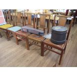 A set of four 1920s oak framed dining chairs, the top rails with exposed dovetails above leather