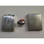 Two silver match-book holders and a miniature silver chick pin cushion