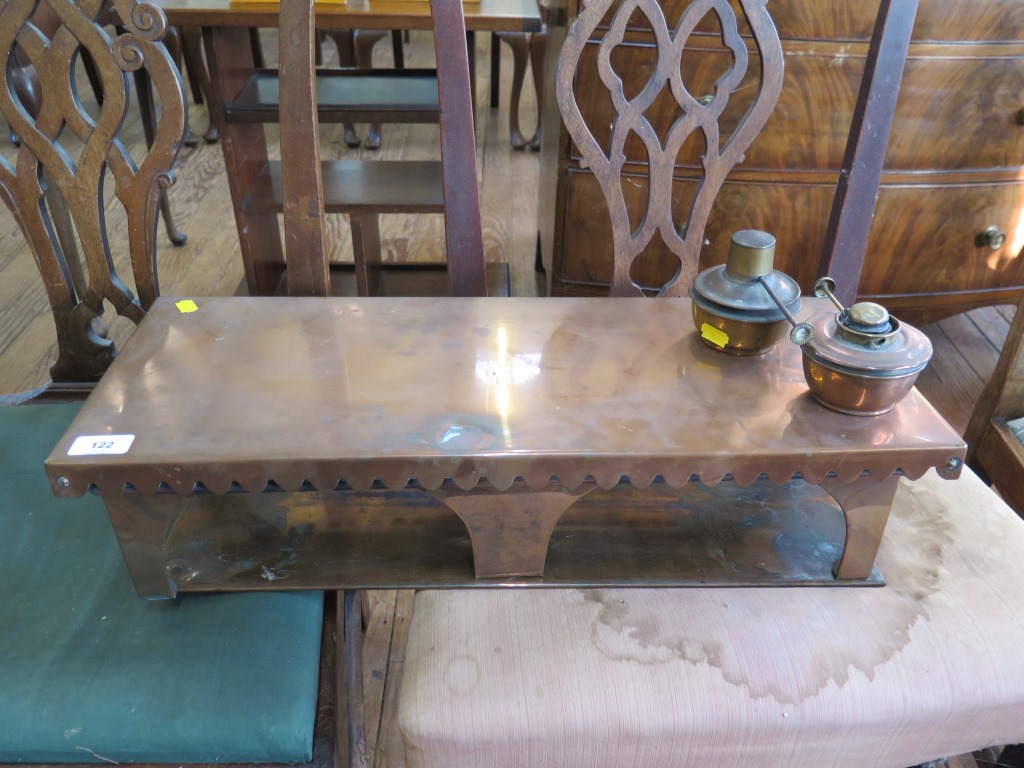 An early 20th century rectangular copper warming serving tray with two oil burners, 61 cm wide