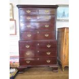 A George III mahogany chest on chest, the moulded dentil cornice over two short and three long