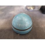 A blue enamel on silver gilt pill box