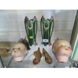 Two Armand Marseille dolls heads, with closing eyes, a pair of leather dolls boots, and a pair of