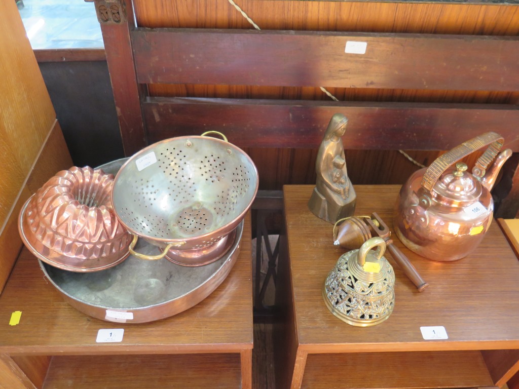 A Victorian copper jelly mould, a copper colander, other copper kitchen wares, a spinning top, a