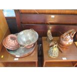 A Victorian copper jelly mould, a copper colander, other copper kitchen wares, a spinning top, a