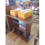 A mahogany book stand with rectangular top and partitioned shelves on a flat base, 71.5 cm wide,