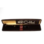 A cased Colibri ball point pen