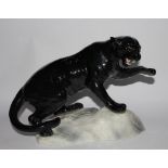 A Beswick figure of a black panther, number 1702, 21cm high