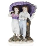 A Porcelain Composition of a Young Couple Sheltering from a Storm