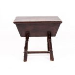 AN 18TH CENTURY OAK SMALL DOUGH BIN with turned legs 80cm wide x 48cm deep x 72cm high