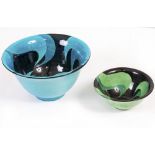 TWO JANE COX 20TH CENTURY STUDIO POTTERY BOWLS one in a blue glaze and on in a green glaze, both