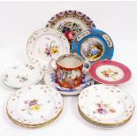 SIX CONTINENTAL PORCELAIN DINNER PLATES with hand painted floral decoration, an Isis blue and