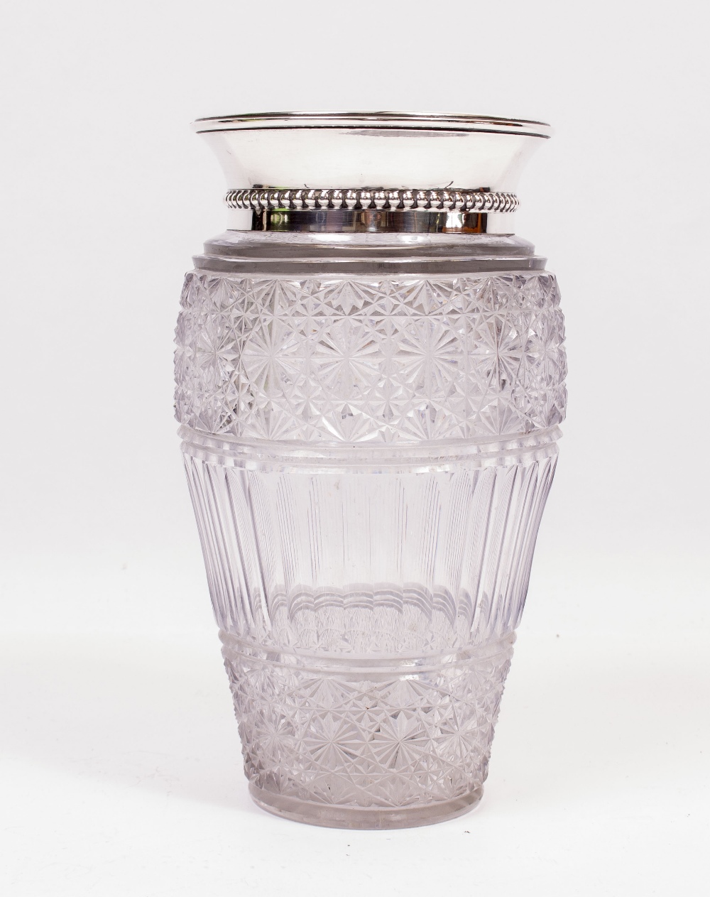 AN EARLY 20TH CENTURY CONTINENTAL CUT GLASS VASE with a white metal rim, 32cm in height