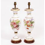 A PAIR OF OPALESCENT GLASS TABLE LAMPS of baluster form decorated with flowers, 50.5cm high
