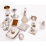 A QUANTITY OF SILVER to include a pair of small silver candlesticks with greek key decoration each