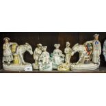 A COLLECTION OF STAFFORDSHIRE FIGURES to include Sand and Beesuns model of a recumbent sheep (with