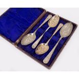 A MATCHED SET OF SILVER AND SILVER PLATED BERRY SPOONS to include two Georgian silver London