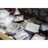A QUANTITY OF JEWELLERY MAKING ITEMS to include beads, pendants etc.,