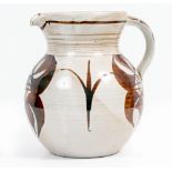 A LARGE ALDERMASTON STUDIO POTTERY JUG with a strap handle and brown painted abstract repeating