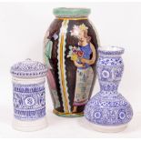 THREE CONTINENTAL TIN GLAZED VASES to include two blue and white shaped examples and one other