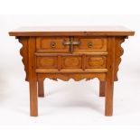 A 20TH CENTURY CHINESE HARDWOOD SIDE TABLE with two short drawers, 119cm wide x 64cm deep x 86cm