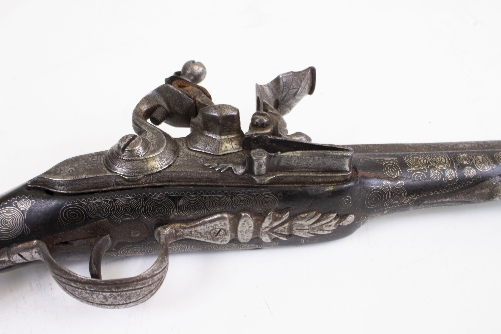 AN ANTIQUE FLINTLOCK PISTOL possibly either Turkish or Southern European with silver wire inlay 48cm - Image 3 of 4