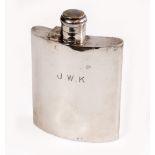 A SILVER HIP FLASK originally retailed by A. Davis of 200 Piccadilly, W1, with engraved initials,