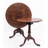 TWO LATE 18TH CENTURY MAHOGANY TILT TOP TRIPOD TABLES with bird cage support on tripod base