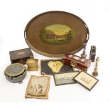 A VICTORIAN OVAL TIN TRAY centrally decorated with a country scene together with various boxes, an