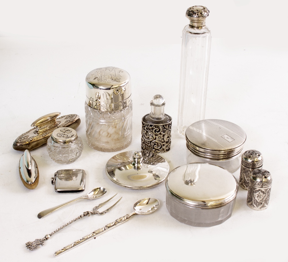 A QUANTITY OF SILVER to include two silver topped jars, two white metal pepperettes, a vesta case