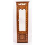 A 20TH CENTURY MARQUETRY INLAID NARROW CUPBOARD or single wardrobe with shaped mirror plate door,