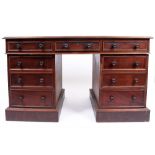 A LATE 19TH / EARLY 20TH CENTURY MAHOGANY PEDESTAL DESK the top with three frieze drawers and the