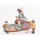 A LLADRO PORCELAIN FIGURINE 'Playful Push' designed by Regino Torrijos, model number 2234, 36cm wide