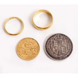 A GEORGE V HALF GOLD SOVEREIGN dated 1911 together with two 22ct gold wedding bands with a